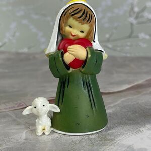 Vintage Midcentury little angel with lamb holding heart.